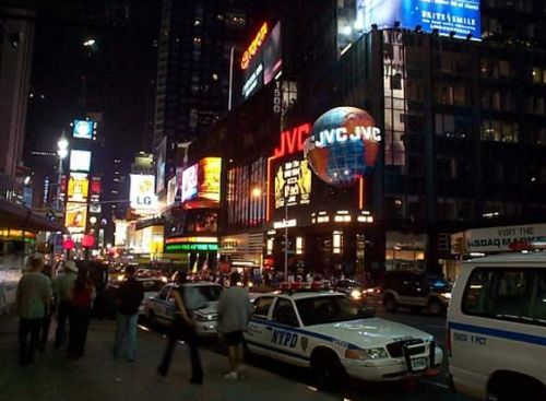  [Photo of Police Vehicule parked at Times Square] 