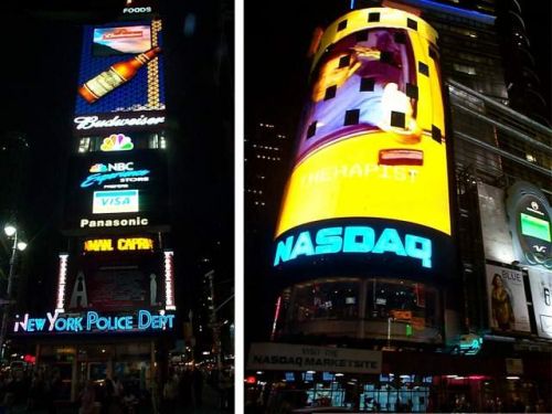  [Photo of Times Square advertisements] 